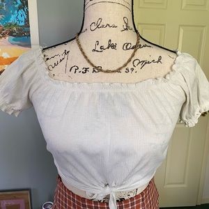 White cropped off the shoulder